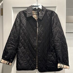 Women’s Burberry quilted jacket with snaps. Black.